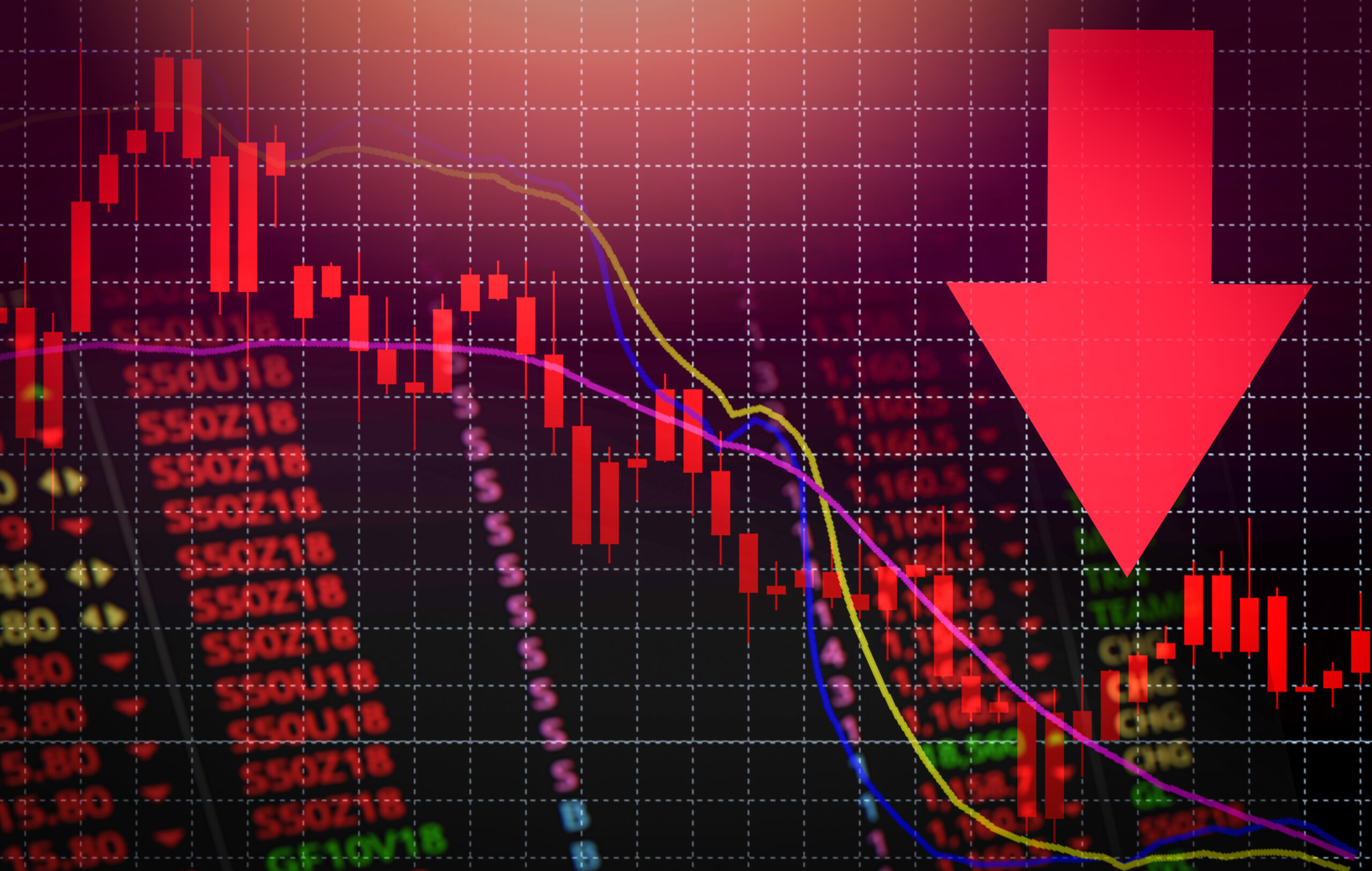 Stock market chart with red arrow pointing down for price drops